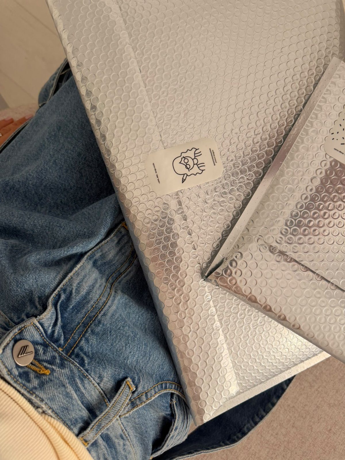 Holding a silver mailer